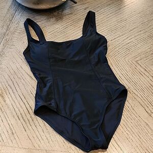 Black one piece swimsuit size S never worn only tried on brand new condition